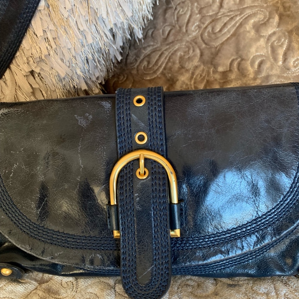 Beautiful blue handbag with gold buckle and trim